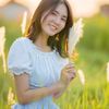 Portrait of Elena Popescu smiling gently.
